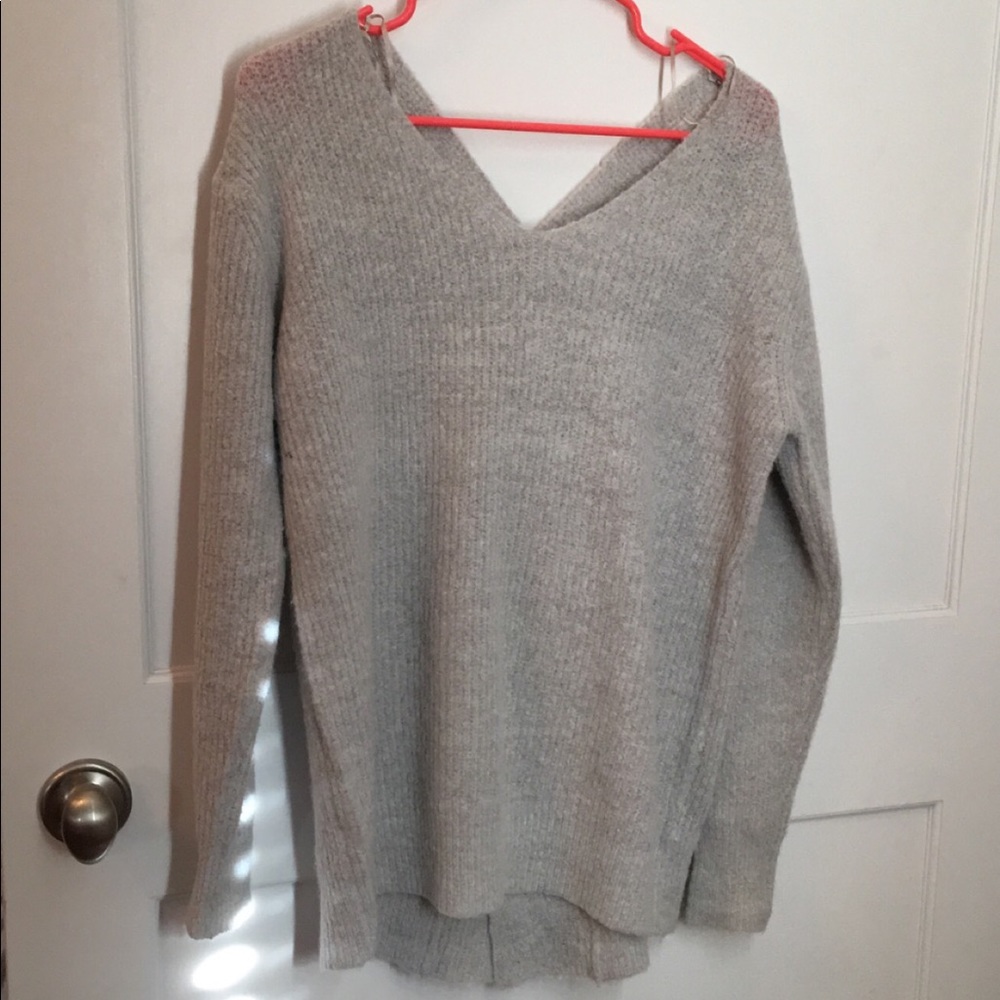 grey sweater with criss cross back